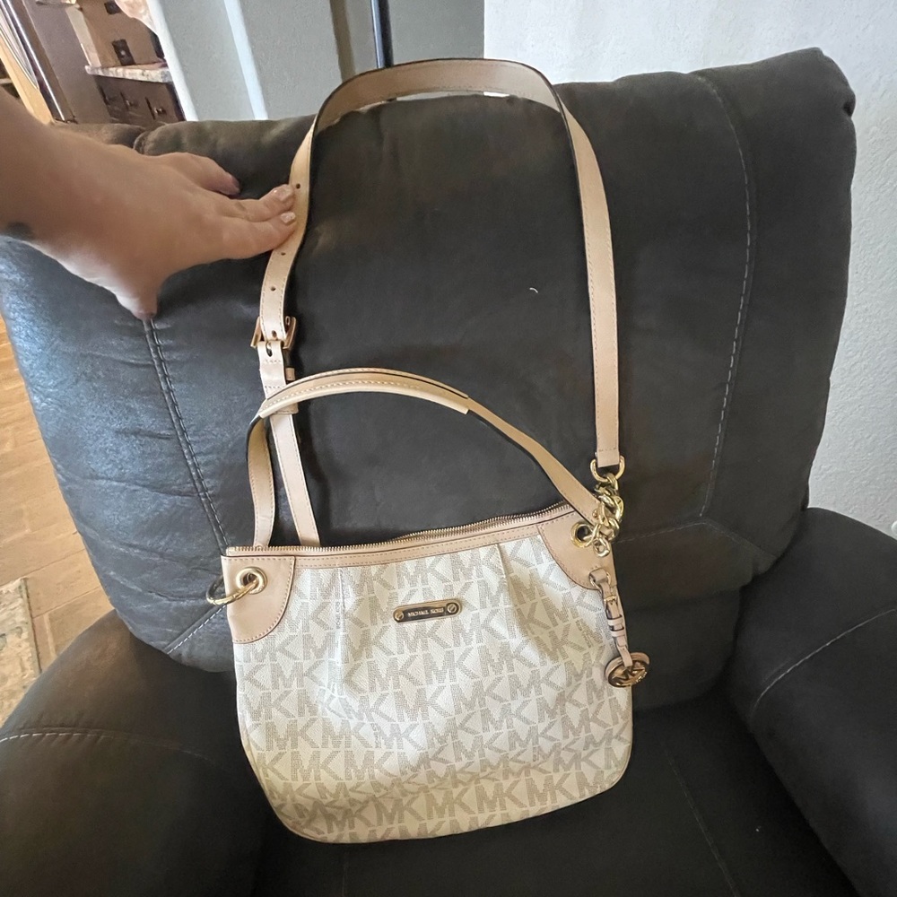 Crossbody or shoulder Michael Kors purse.